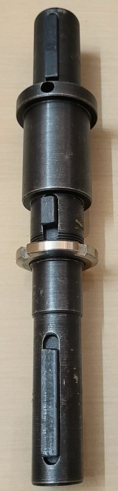 Machined steel spindle with keyway and stepped diameters