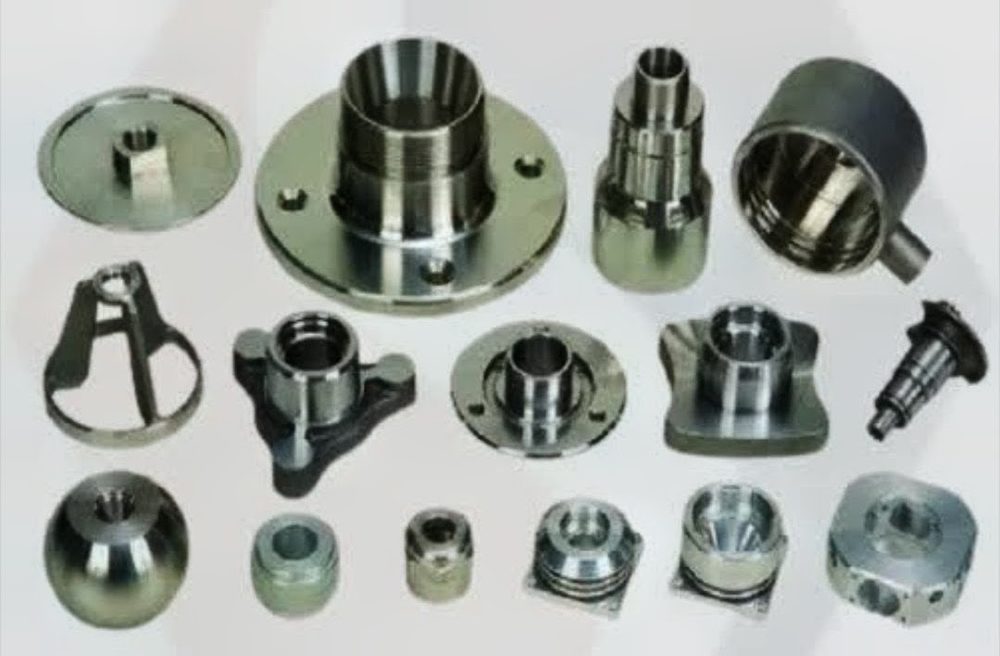 An assortment of precision machined components in steel and alloy
