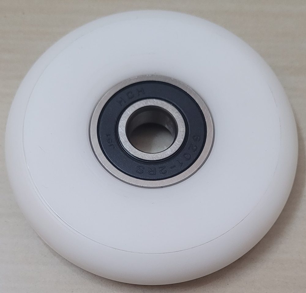 White nylon wheel fitted with a sealed ball bearing
