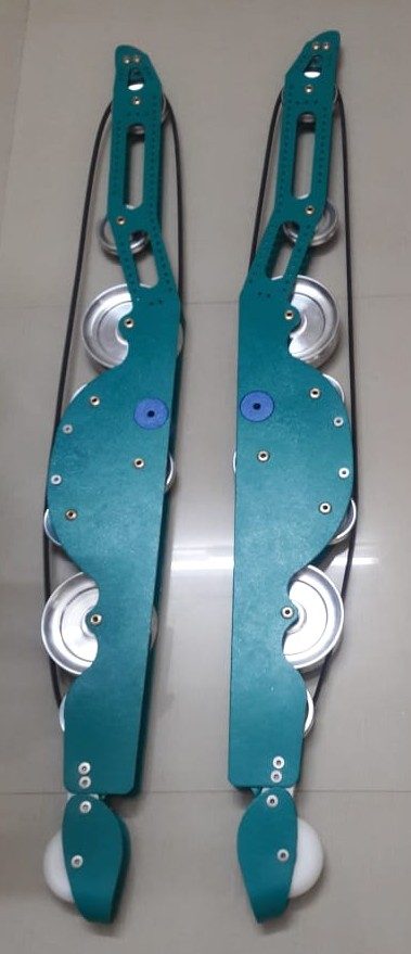 Pair of textile machine cam plates with rollers