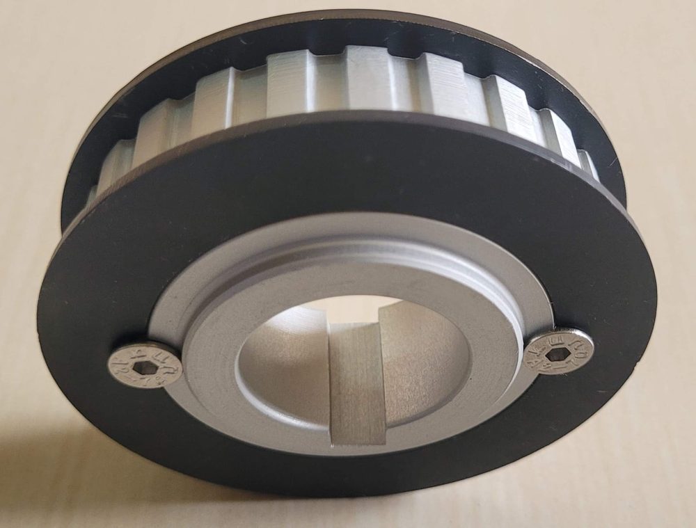 Timing pulley with bonded flanges